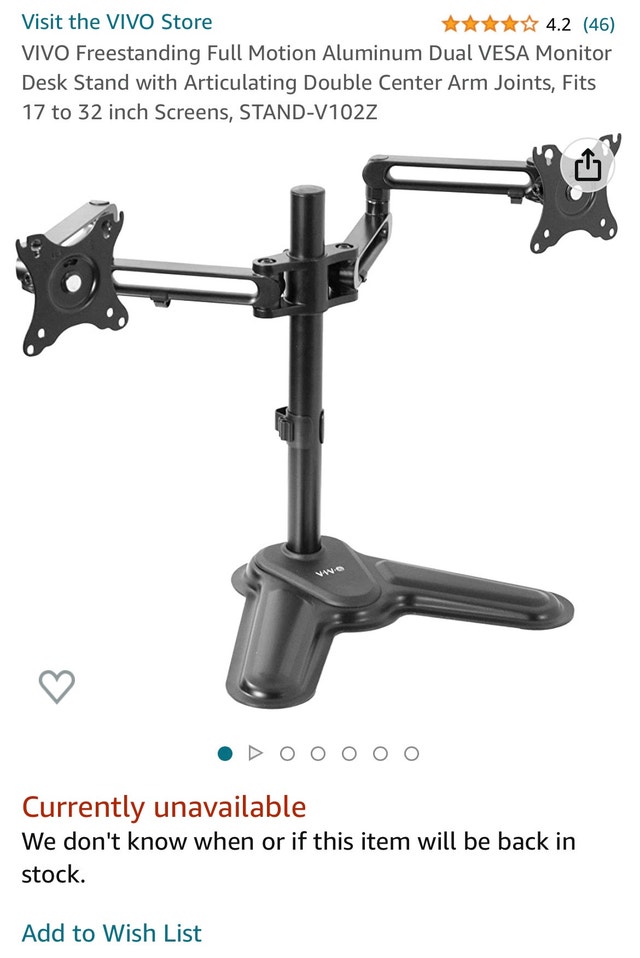 Freestanding Dual monitor stand. Monitors up to 32”. Monitors