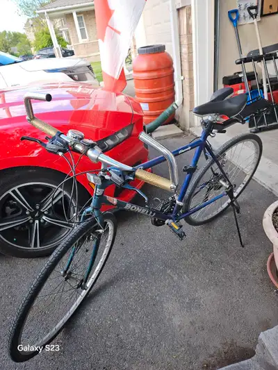 Bronelli Chromoly Men's Bike. 46" approx. from ground to top of handle bars. Works well. Panier hold...