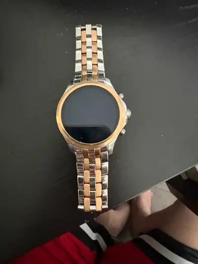 Check out this Emporio Armani Smartwatch! This watch is in used condition but has been well taken ca...