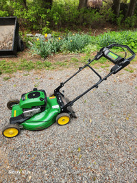 22"  John Deere self-propelled lawn mower. EXcellent condition,