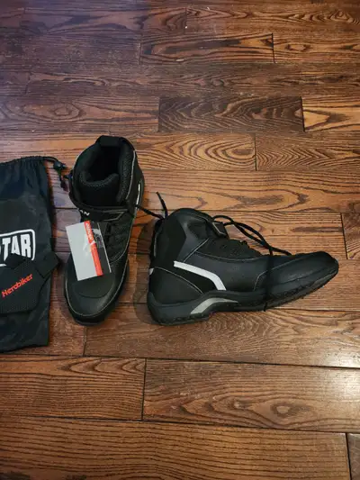 Never worn. Tags still attached. Excellent ankle and toe protection. Comes with drawstring bag and t...