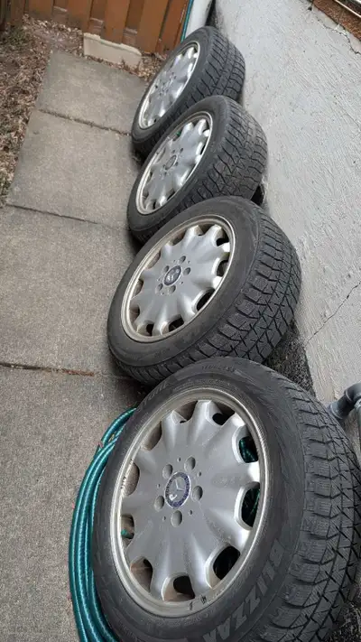 4 pieces A2104010602 rims with winter tires. Rims 16x7.5. Tires have tread for winter or two. Asking...