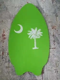 Green Skimboard -with palm tree and moon made out of wood (type unkown) -Purchased in South Carolina...