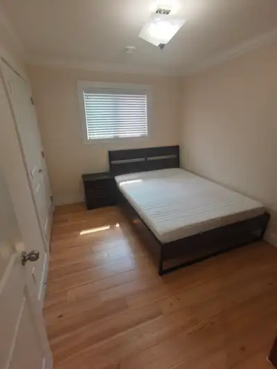 Live in a new built hosue and a furnished room with a bed, clean bedsheets, table and chair. Easy ac...