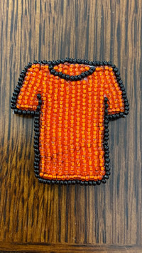 Handmade beaded Every Child Matters pin