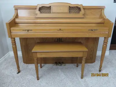 Wurlitzer Piano Model # 2475 Size: 57"L x 24"W x 42" H Openable Piano Bench Size: 29"L x 14.5"W x 19...
