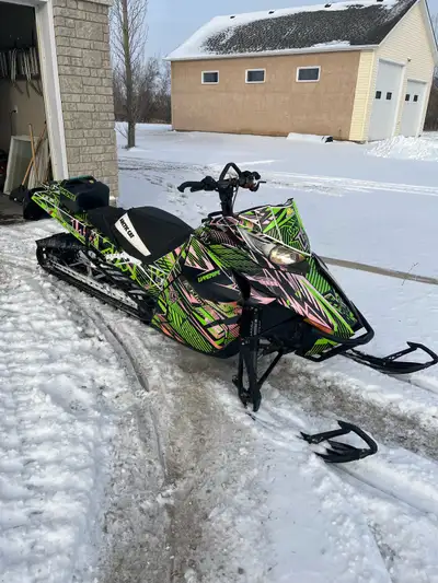 Selling a 2014 Arctic Cat M8000 for nephew. Only has 589 miles currently. Owner has a young family a...