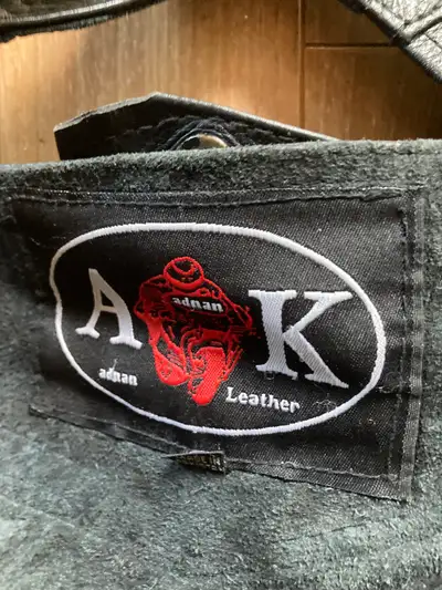 Leather motorcycle chaps size Large and 2 pairs of motorcycle gloves