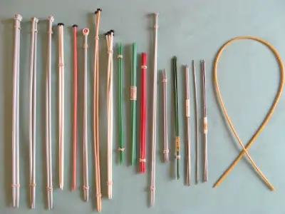 Assortment of knitting needles, View more