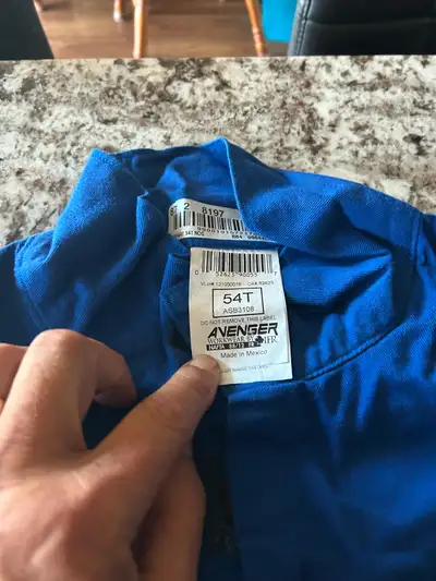 7 pairs of Avenger 7oz Style 3108 ( Blue ) coveralls. Size 54T.