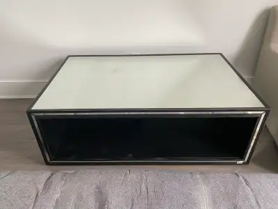 The item is a high-end luxury coffee table (Restoration Hardware). Original price ($2000). Great con...