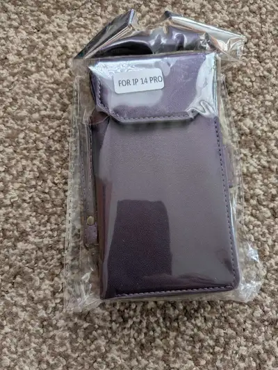 Selling brand New iPhone 14 Pro 11 card Wallet with 2 cash spots in dark Purple color for $15.