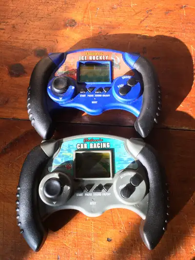 Vintage Toy Quest Handheld Electronic Hockey and Racing  Game, View more
