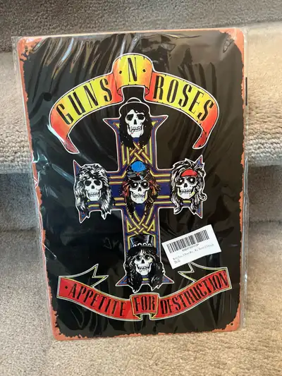 This Guns N' Roses sign features the iconic 'Appetite for Destruction' imagery, perfect for any fan'...