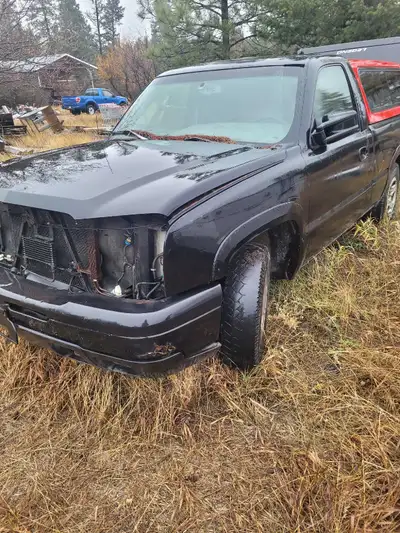 Parting out 2000s chevy silverado cat eye truck has been spray painted matt black so the body is not...