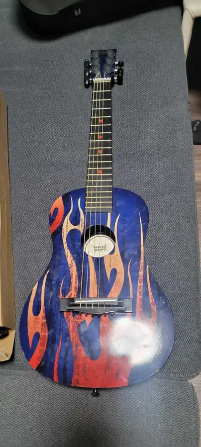 First Act Acoustic Guitar, View more