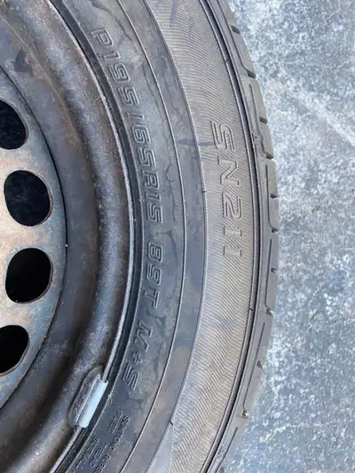 Tire on 5 bolt steel rim. Used rim but tire has never seen the road. (Was a spare tire for a VW)