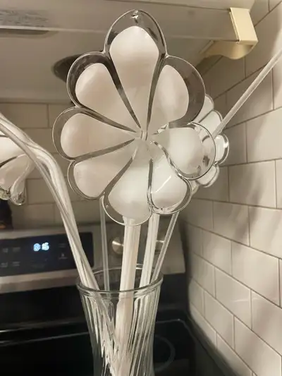 Add a touch of everlasting spring to your home with these delicate glass flowers! This set of three,...
