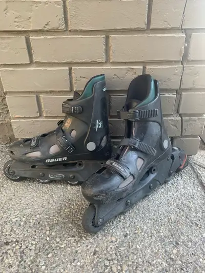These are a pair of used Bauer inline skates, perfect for recreational skating or roller hockey. The...