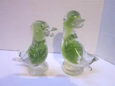 This pair is in good used condition with no damage. The taller one measure 5&1/2 inches tall, and th...