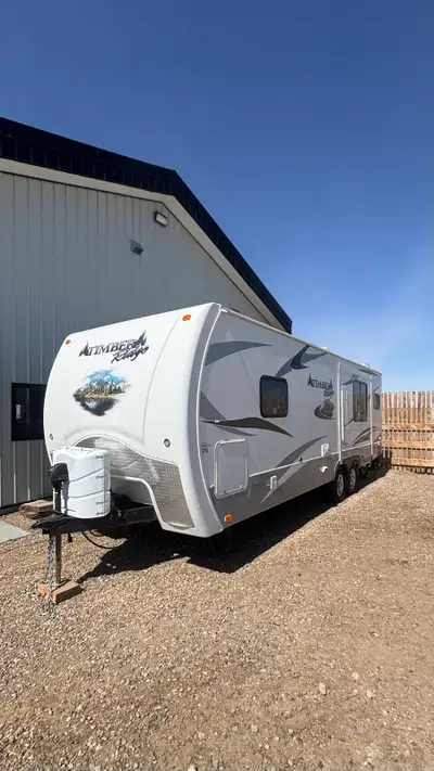 Timber Ridge 250RLS. Well-built and ready for camping in any season. This unit is clean and in good...