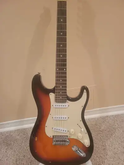 Electric guitar and amp., View more
