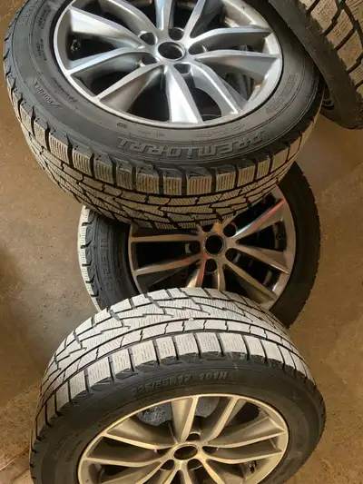 Selling tires off my 2014 q50, brand new winter tires used for 1 season! Rims are OEM Infiniti and a...