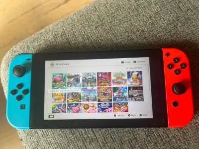 Nintendo switch unpatched modded with 64gb, View more