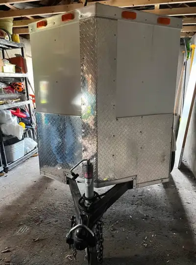 $4000 to $4500 new plus taxes. Approximately $1000 in accessories included. 2 tire chocks included....