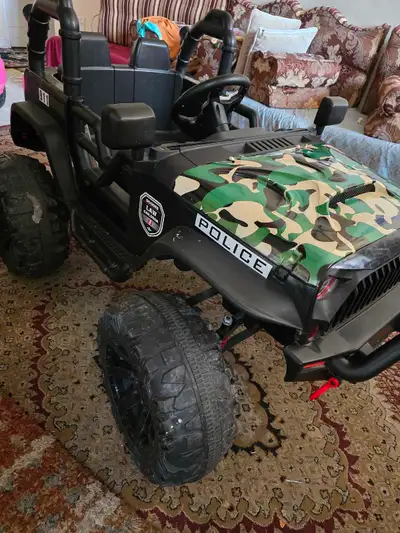 Police electric car stop working but still in good condition It come with charger and remote control...