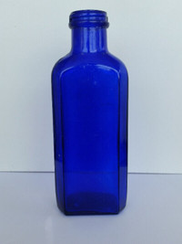Henry K. Wampole / Cobalt Blue Medicine Bottle / 6.5 Inches Tall