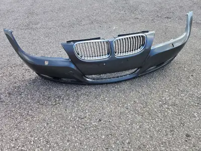 BMW E90 front bumper cover used. It's missing the headlight washer covers. Tasman colour. $200 OBO.