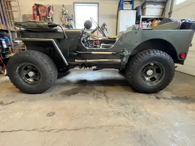 This classic 1942 Willys MB is a stunning, well-maintained piece of history that captures the rugged...