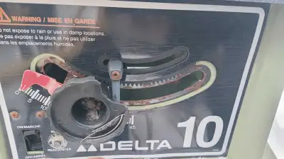 This Delta table saw is a robust tool for any woodworking enthusiast or professional. It's in used c...