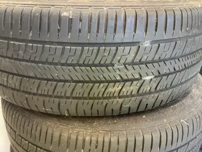 Good condition tires on Mazda 3 original aluminum rims