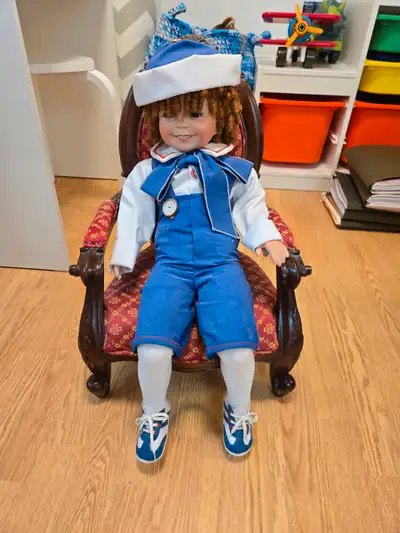 Selling this porcelain doll with the chair. Item is as shown in great condition. Measurements (in ch...
