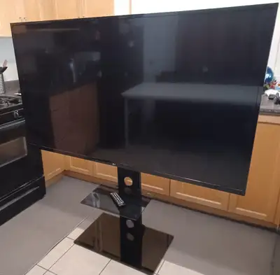LG 65" 4K Smart TV with Swivel Floor Stand, View more