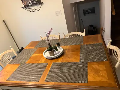 Farmhouse table and 6 chairs Distressed Cream color Table has built in leaf - with the leaf in the m...