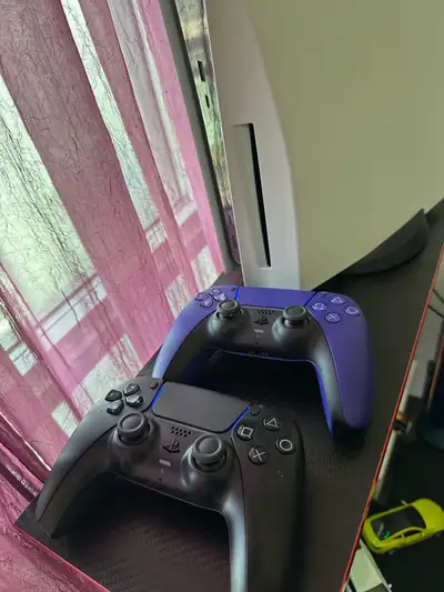 ps5 disc  and 2 joystick, View more