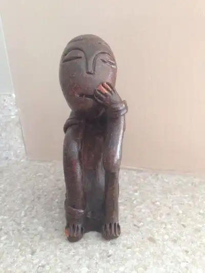 Small clay statue. Can also be used as a napkin ring. Handmade.