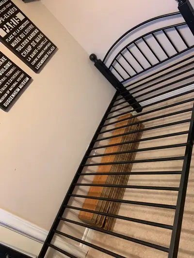 Twin platform bed Includes headboard, footboard and metal platform with hardware. Reduced to half pr...