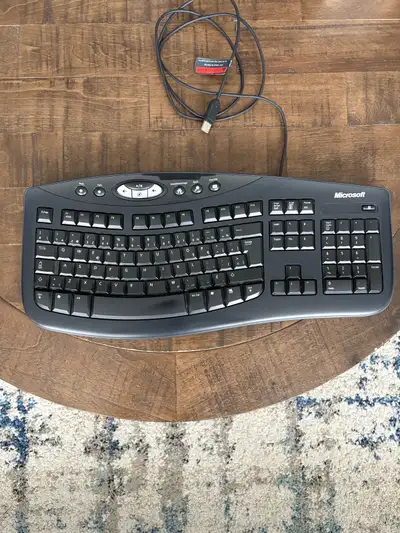 Microsoft Curved comfort wired keyboard with number pad, View more
