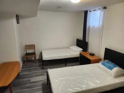 Enjoy this brand-new furnished basement apartment with separate entrance via garage completed with t...