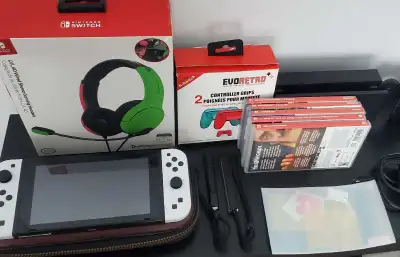 Nintendo switch V2 Bundle + 5 games + 64 GB SD card, View more