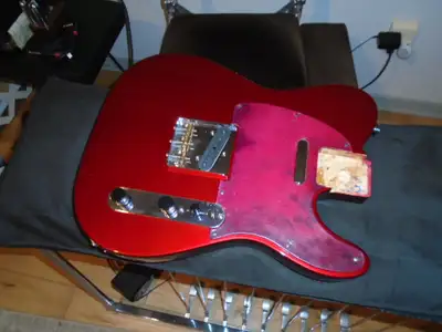 A loaded mim Fender Alder body in Candy Apple Red mint...Carparelli Control Plate...Fender Vintage 6...