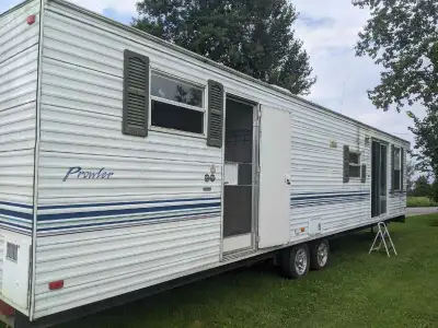 40 foot Fleetwood camper (prowler) Bought last year. Sealed the roof. (No leak) had plans of updatin...