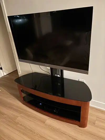 Sony Bravia TV with TV stand, View more