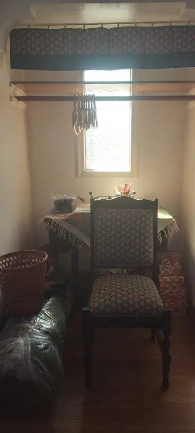 Singer pedal sewing Machine includes newly re-upholstered matching chair, valance, and wicker waste...