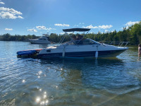 Bayliner 21’ cuddy boat and trailer 