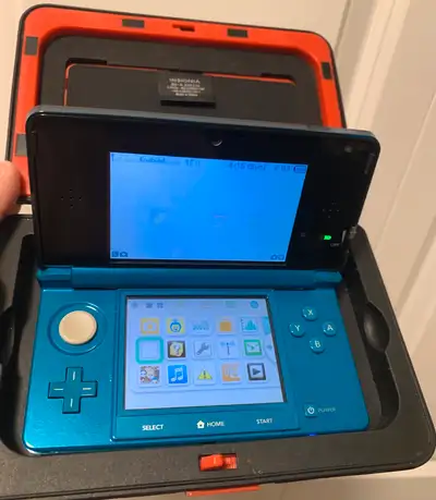 I'm selling a mint condition Nintendo 3DS in aqua blue, with charger and the carry case is 25$! It's...